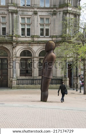The Iron Man statue by Anthony Gormley in Victoria Square, Birmingham, England