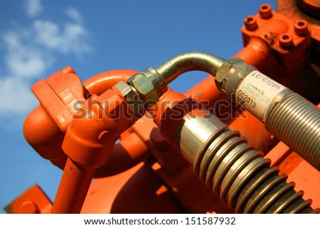 details excavator hydraulic hoses and shadow