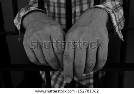 Hands of prisoner