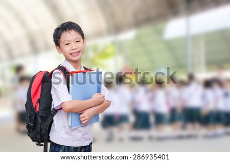 Asian student in uniform at school