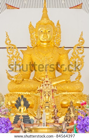 sitting golden buddha image at a temple ,Thailand