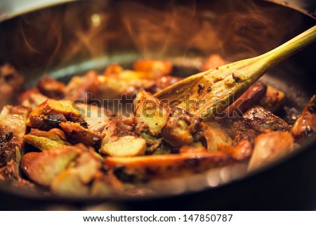 Steaming Food In The Frying Pan. Cooking Concept