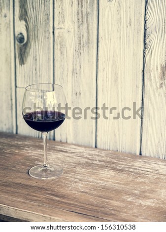 Glass of wine. Rustic vintage setup. Food and beverage concept