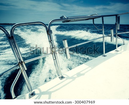 Motor power boat speeding on the Atlantic Ocean. Vacation, summer, travel, water sports,  lifestyle concept, boat rental and sales concept.