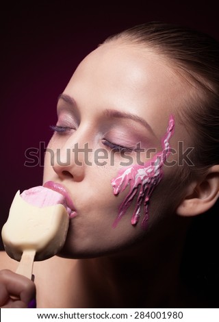 Sensual woman with ice cream is melting down