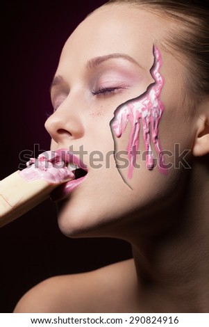 Fashionable girl eating ice-cream and melting down