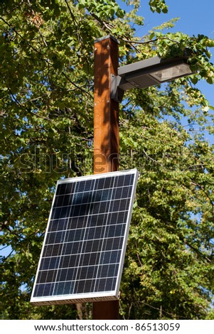One small solar battery, which provides electricity not only for lamp, but for sockets on post\'s base.