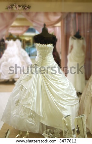 stock photo wedding dress is shown in shop window of luxury boutique