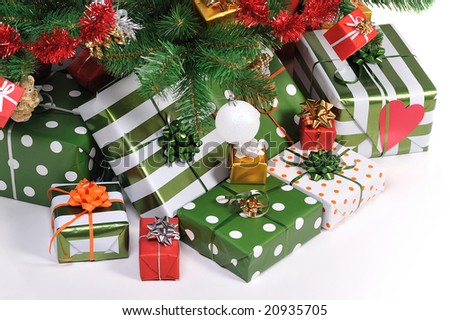 Christmas gifts under decorated Christmas fir tree