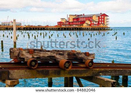 Cannery Pier in Astoria Oregon with water and rusted rail