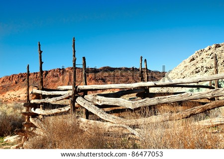 Rail fence in Arches National Park with red rock