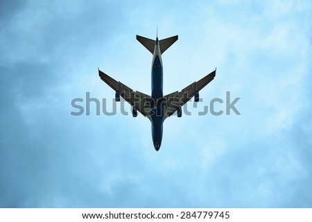 ST. PETERSBURG, RUSSIA - JUN 21, 2014: A Boeing 747 in the sky with landing gear comes in to land at the airport Pulkovo.