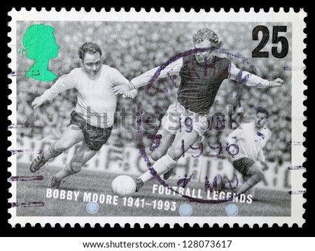 UK - CIRCA 1996: A postage stamp printed by United Kingdom, shows legendasry English football player Bobby Moore, circa 1996, in the UK.
