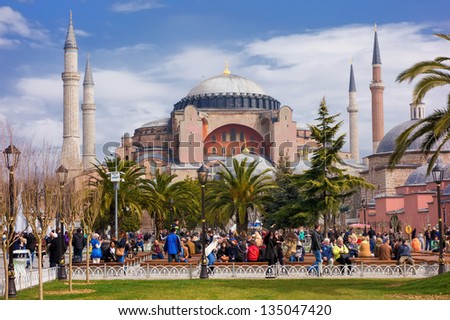 ISTANBUL, TURKEY - MARCH 9: Local and foreign visitors are enjoying their time in Istanbul\'s famous Sultanahmet Square on March 9, 2013, in Istanbul, Turkey.