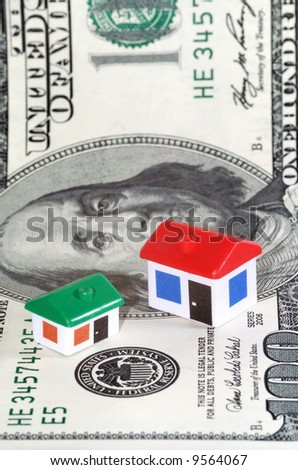 Model houses on dollar banknote