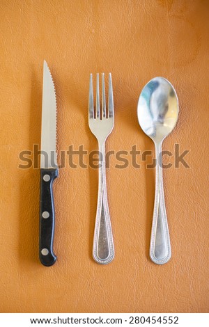 spoon fork and knife for eat food on the table