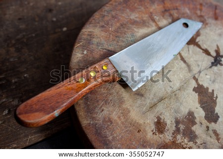 old block and old knife are dirty