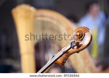 Harp and violin at concert