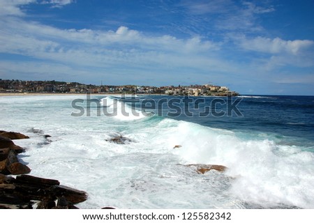 Bondi to Coogee coastal walk, Sydney, Australia. A cliff top coastal walk extends for 6 km in Sydney eastern suburbs. The walk features stunning views, beaches, parks, cliffs, bays and rock pools.