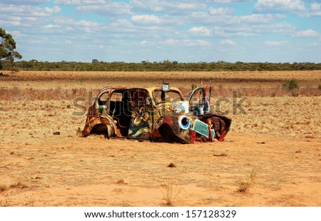 MUNGO NATIONAL PARK, AUSTRALIA - MARCH 10: Old painted car. The central feature of the Park is Lake Mungo, the second largest of the ancient dry lakes. Mungo National Park, Australia - March 10, 2013