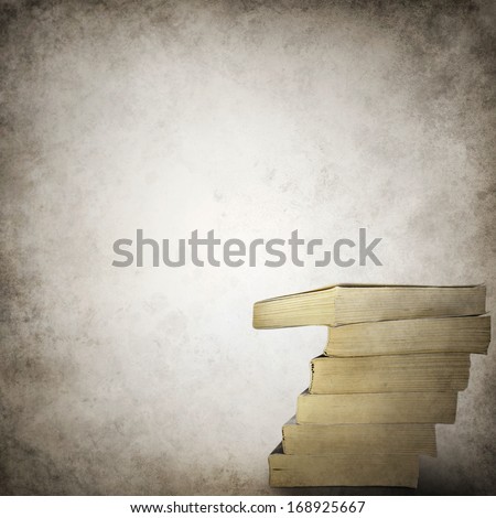 Grunge background template with stack of books