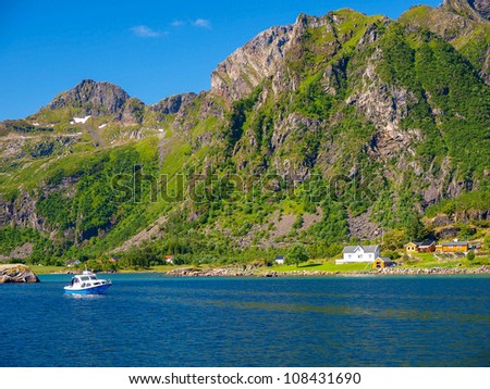 beautiful mountainous landscape around Norwegian fjord in sunny day