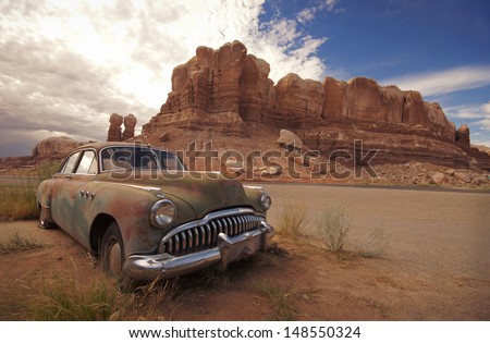 Desert Relic/Old Car Rusting Away In The Desert
