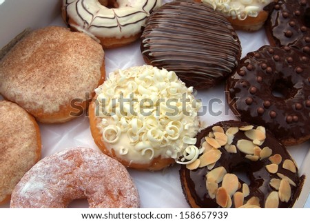 set of donuts in box close up