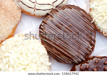 set of donuts in box close up