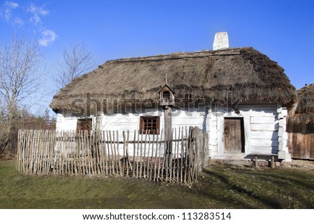 Old, wooden house in Tokarnia, Poland.