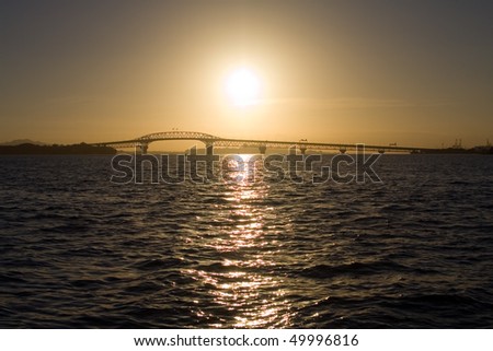 Sunrise over the Auckland Harbor Bridge and Waitemata Harbor