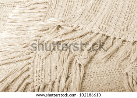 fabric colored in beige tones, textural background