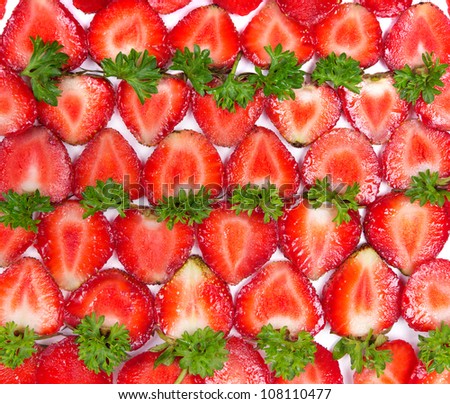 Background texture of fresh red sliced strawberries