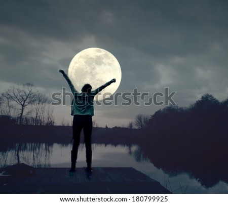 Young woman in moonlight