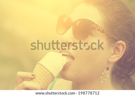 Vintage photo of woman eating ice cream
