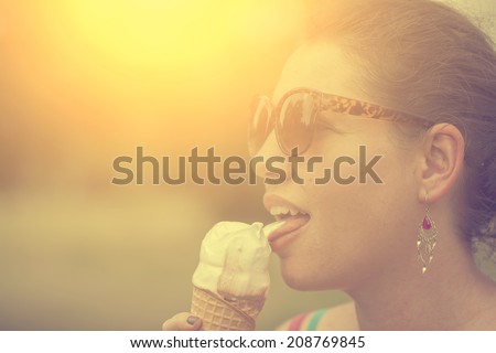 Vintage photo of woman eating ice cream