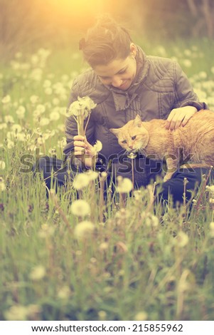 Happy woman with a cat