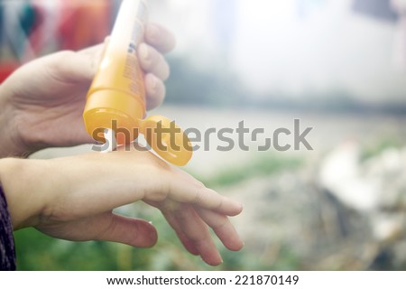 Woman use hand cream on dry hand