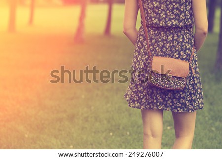 Woman with leather bag