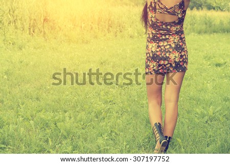 Woman legs and short skirt