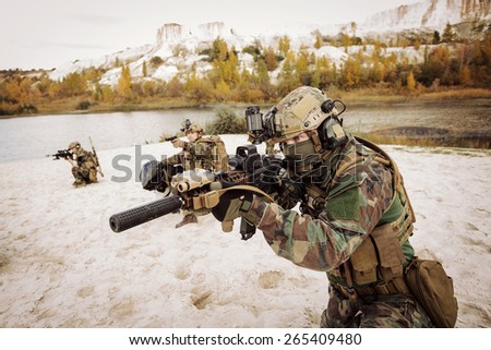 Rangers aiming at a target of weapons