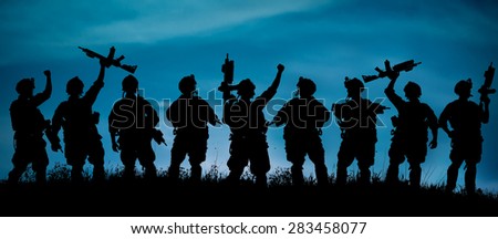 Silhouette of military soldiers team or officer with weapons at night. shot, holding gun, blue colorful sky, background