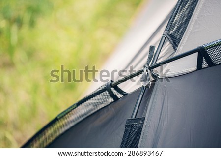 part Grey big tent in summer forest