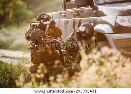 Russian special forces operators in uniform and bulletproof vest and helmets