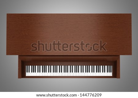 top view of brown upright piano isolated on gray background