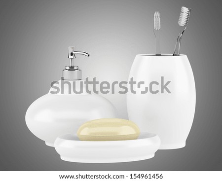 soap and toothbrushes isolated on gray background