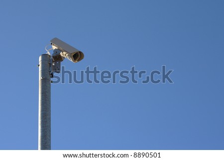 camera watching control remote blue sky