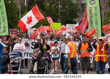 TORONTO - June 7  , Thousands of people joined Sit-in and March in Queen\'s Park to protest the Liberal government\'s controversial sex-education curriculum.   June 7 , 2015 in \
Toronto, Canada.