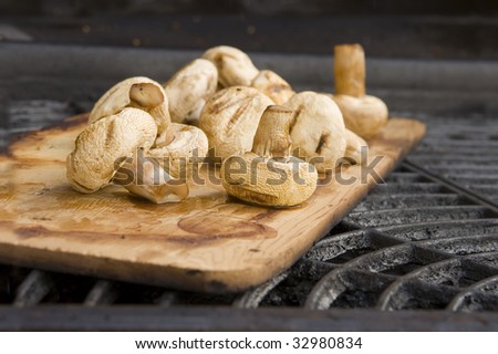 wood smoked mushrooms on the grill