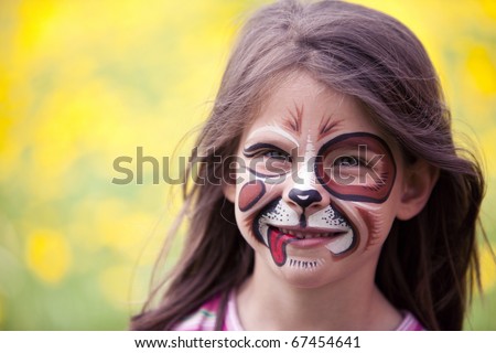 happy face painted girl